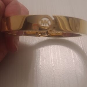 Michael Kors Polished Gold MK Cutout Hinge Bracelet